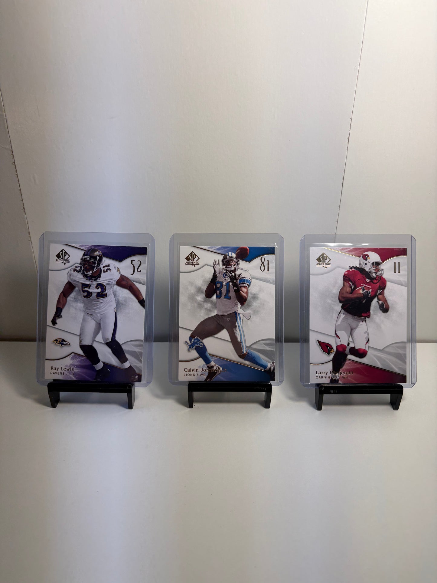 Lot of 3 Football Cards (Ray Lewis, Calvin Johnson, Larry Fitzgerald)